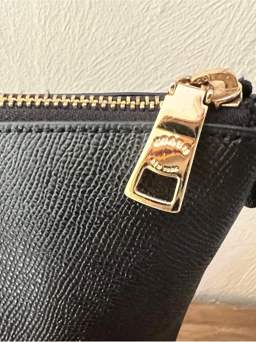 Coach sleek leather